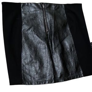 Massimo Size 12 black pieced faux leather mini lots of stretch